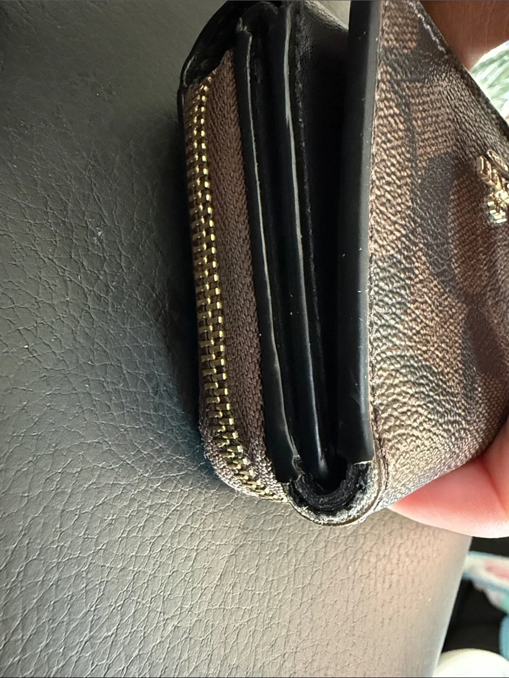 Coach Small Trifold Wallet crafted in Signature coated canvas